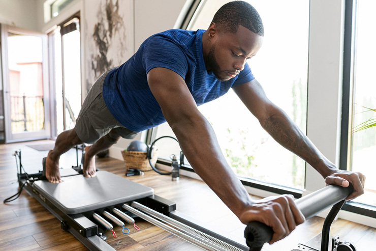 Pilates Reformer per uomini e atleti con lavoro sul core